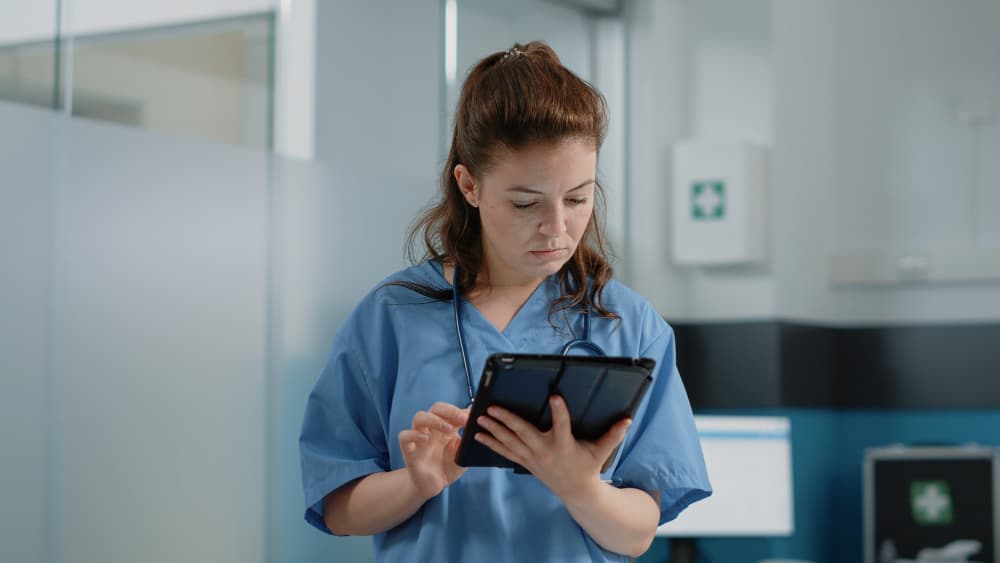 Travel nurse reviewing job listings